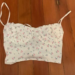 Ties in the back with straps and floral print